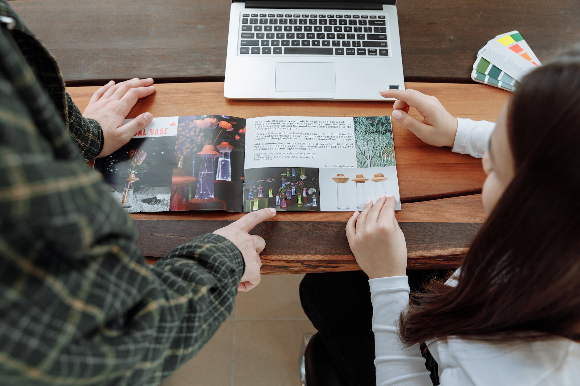 3 Ways to Drive Traffic With Local Marketing coworkers discussing about the brochure information