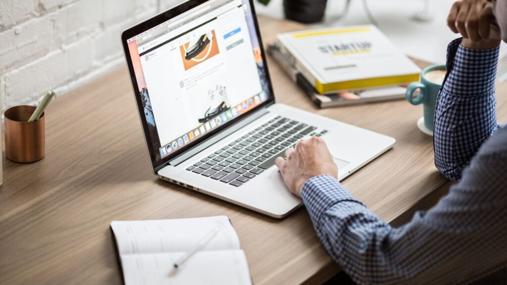 Website Platforms for Churches: 4 Outstanding Options Photo showing a person looking at a church website.